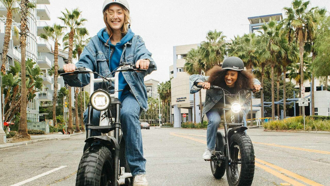 A pair of Super73 ebike riders commuting to work