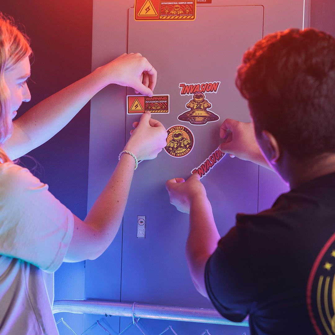 Lifestyle image of the sticker pack being used to decorate a locker.