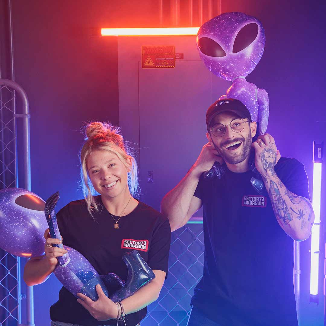 Front view image of Eclipse T-Shirt on female and male models.
