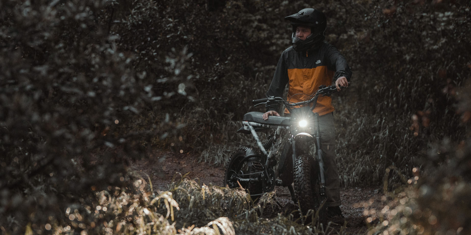 Super73 ebike rider posing outdoors with a Super73 Adventure Series ebike