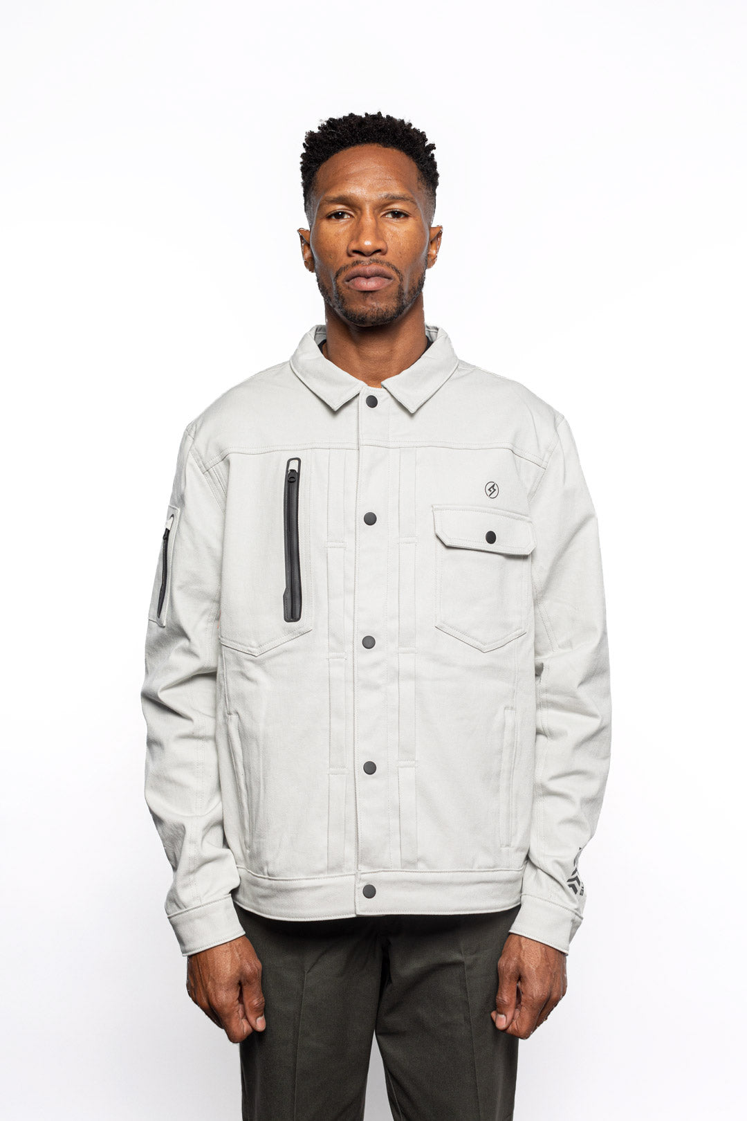 Male model wearing Anvil Chore Jacket in chalk colorway.