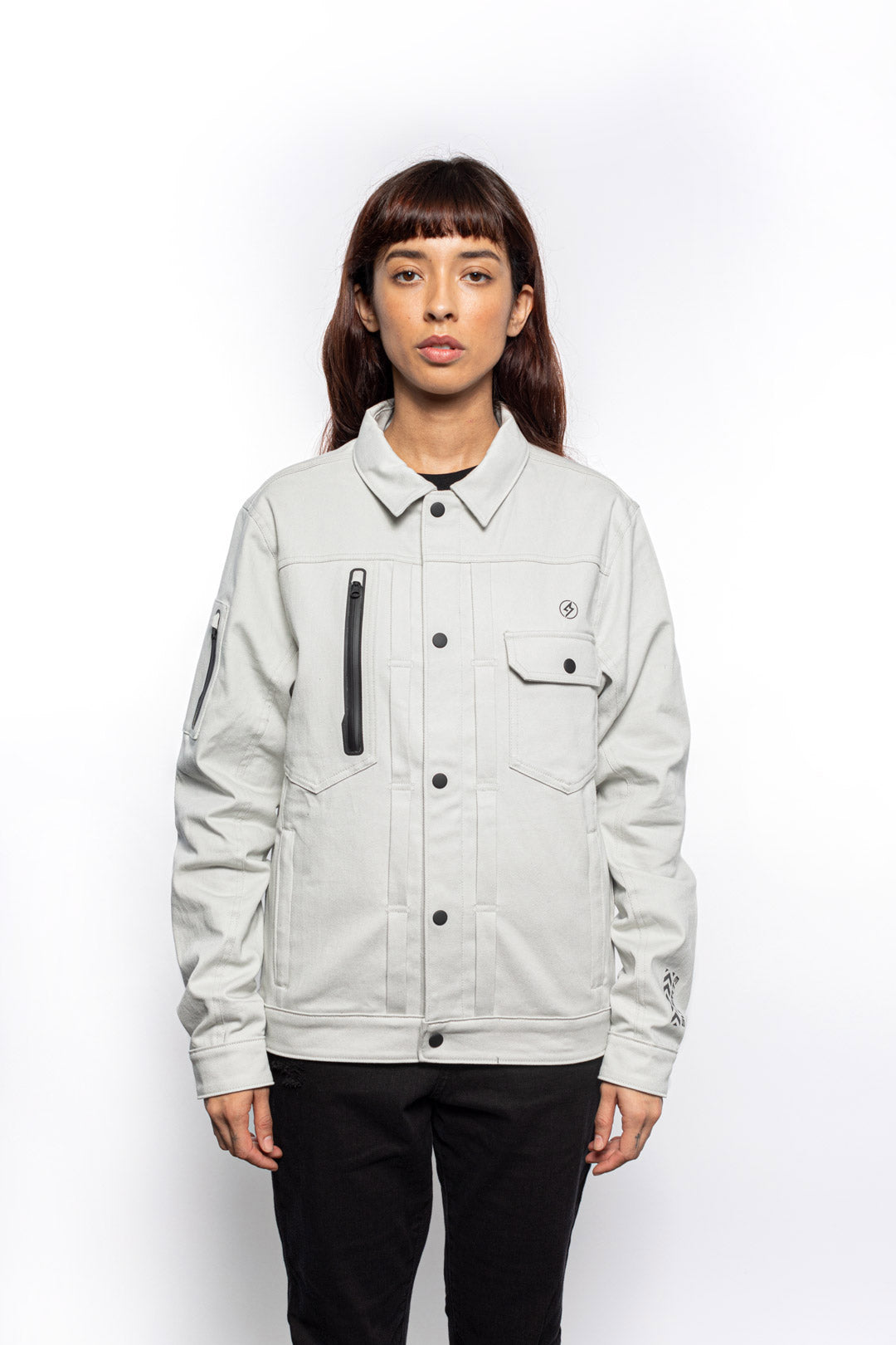 Female model wearing Anvil Chore Jacket in chalk colorway.