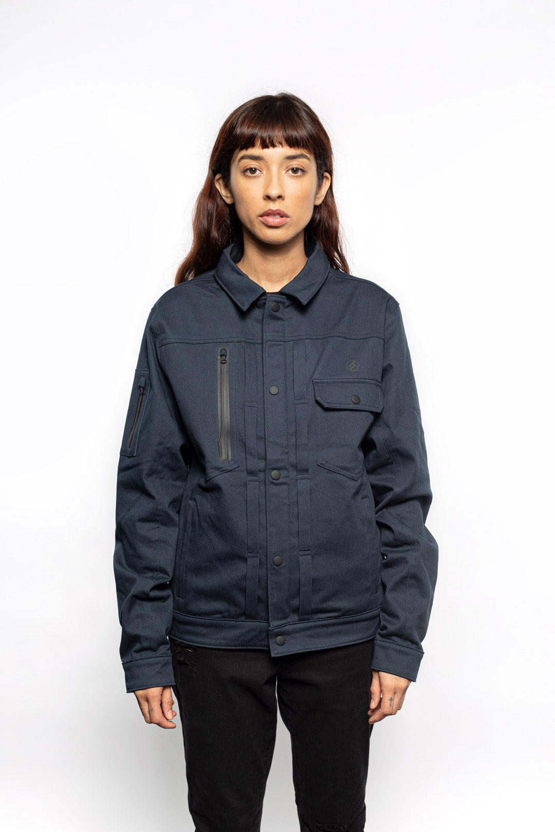 Female model wearing Anvil Chore Jacket in midnight colorway.