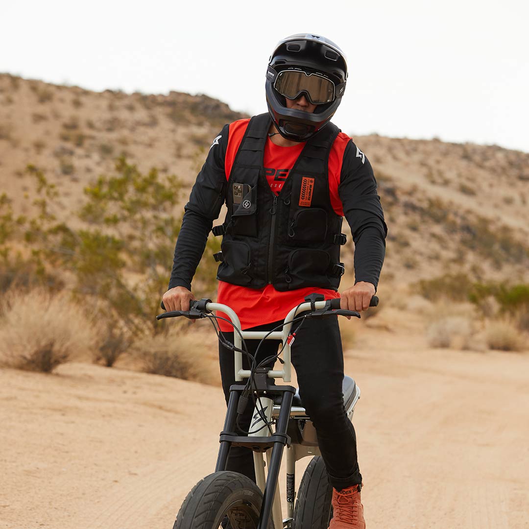 Super73 rider wearing Super73 Tactical Mule hydration vest