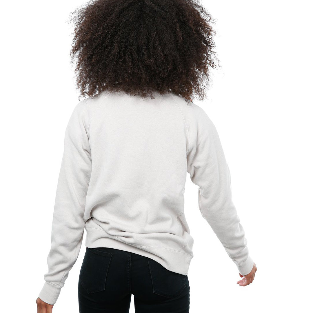 Back view of female model in Stone Classic Crew Sweatshirt on white background.
