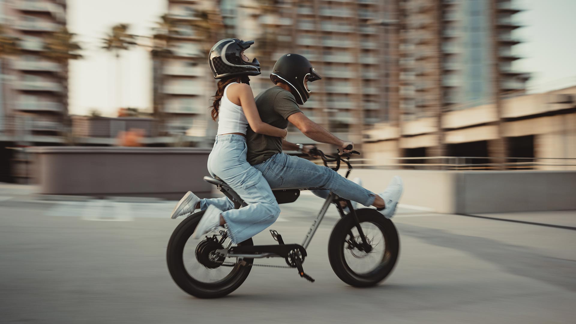 Lifestyle image of college friends enjoying their SUEPR73 ebike.