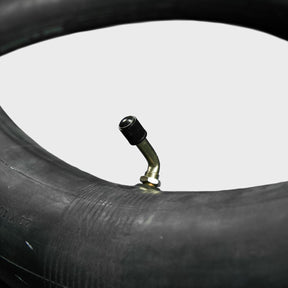 Inflated closeup of Inner Tube 20 x 4.5/5" on white background.