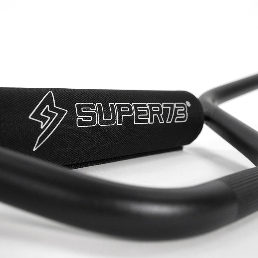 Closeup of Super73 logo on handlbar pad