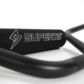 Closeup of Super73 logo on handlbar pad