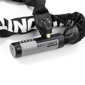 Kryptonite 990 lock on white background closeup with key