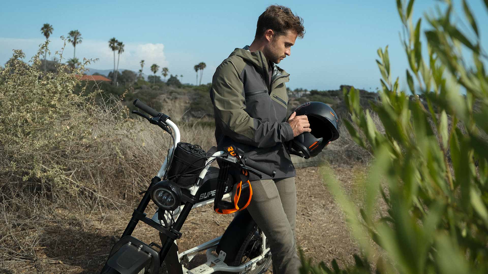 A rider taking a break from having fun riding their SUPER73 e-bike