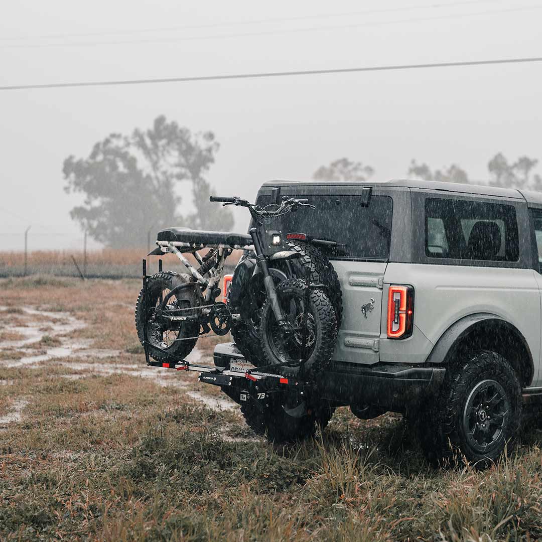 Lifestyle image of the R Adventure secured on the back of a Bronco.