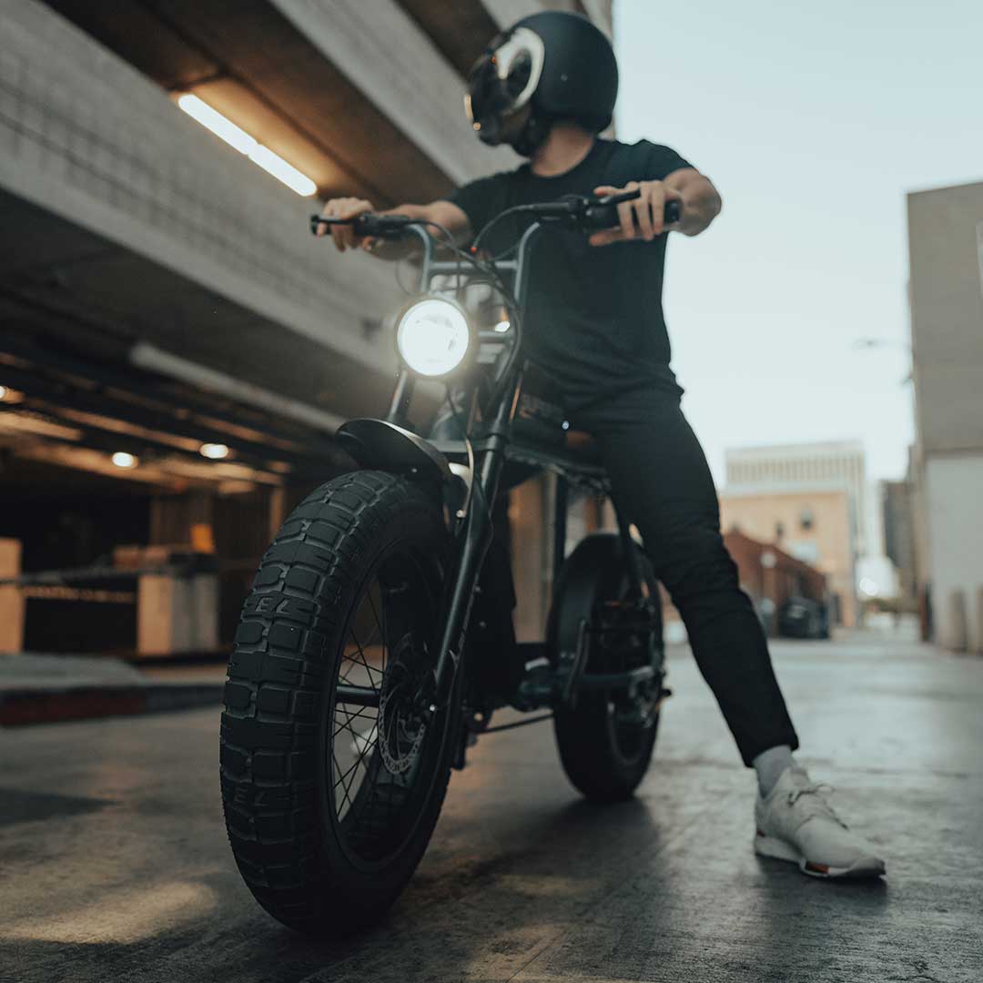 Super73 S2 ebike in front of parking garage with light on