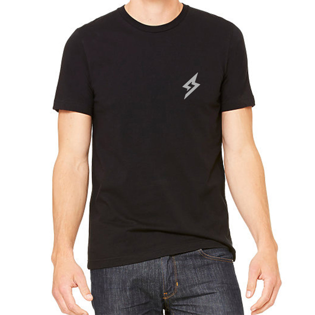Front view of male model in Black Logo Pocket Tee on white background.