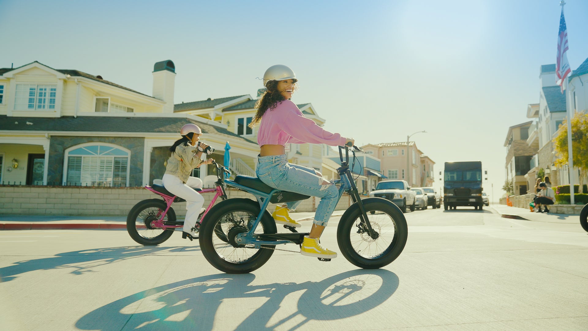 Riders enjoying Z-Miami bikes in a neighborhood