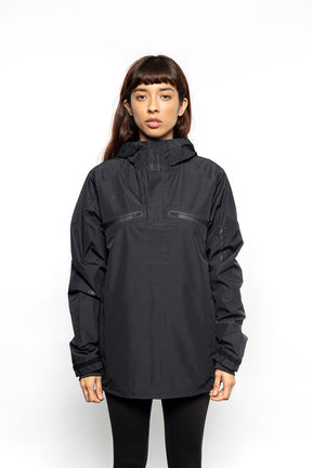 Female model wearing Royce Harrington Jacket in black colorway.