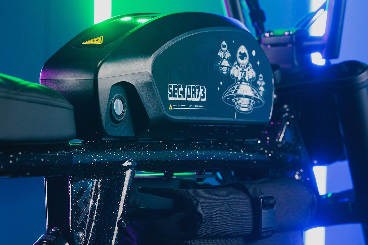 Closeup image of the SECTOR73 R Brooklyn CosmicDust bike Battery decals.