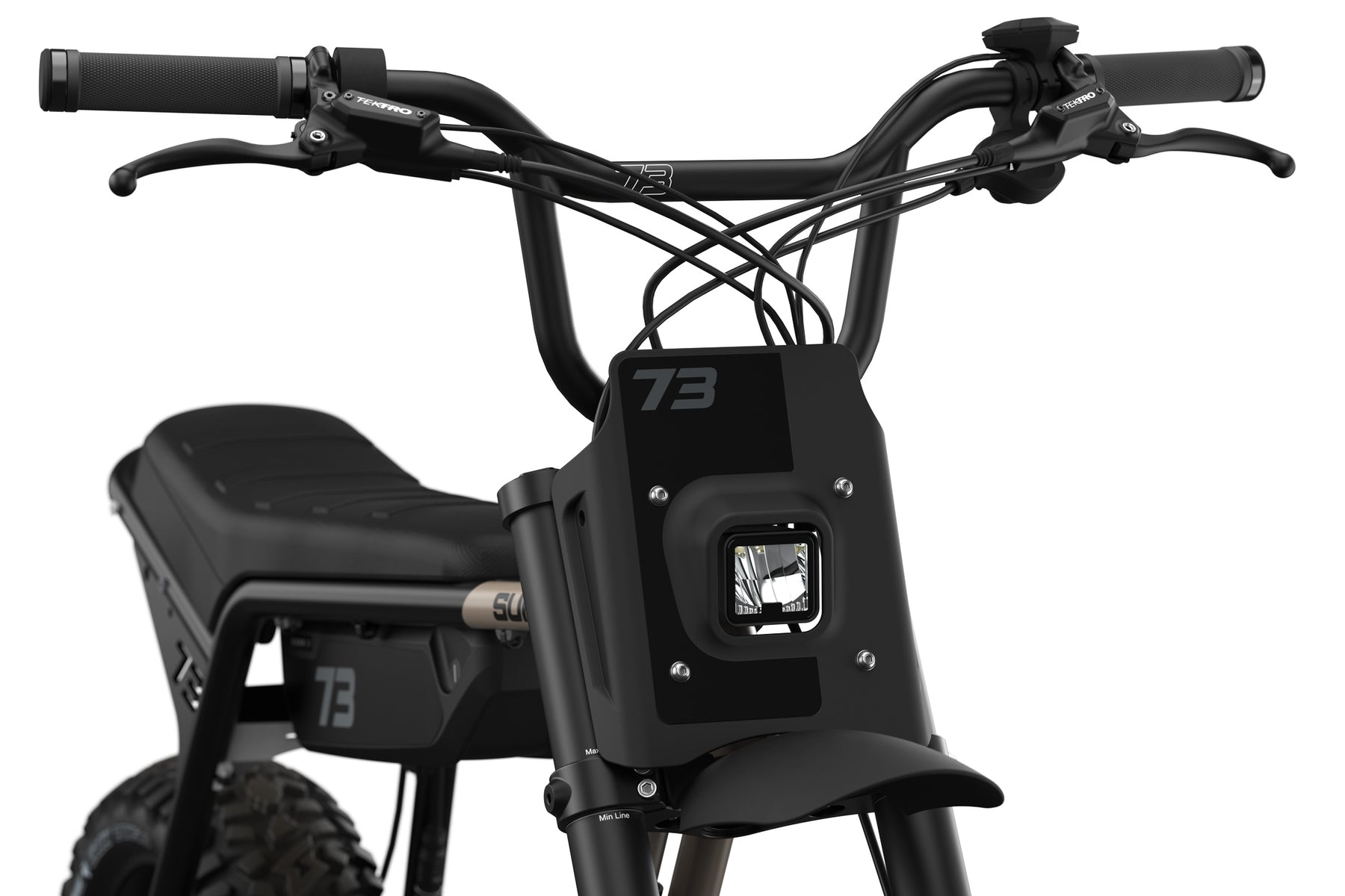 Closeup of Super73-Z Adventure Sandstorm headlight and handlebars